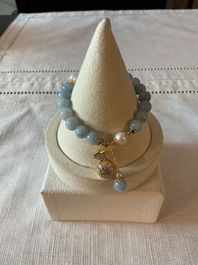 Blue Cat’s Eye Glass and Freshwater Pearl Gold Tone Stretch Bracelet